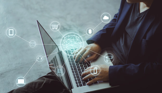 Top angle and closeup view  of businessman using the laptop making online shopping and banking payment. Blurred background .