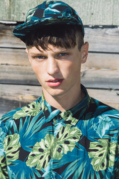 Headshot uper stylish teenage guy, outdoors