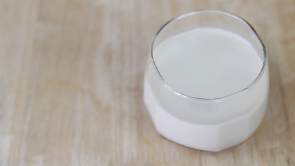 Milk in glass bottles, closeup, background