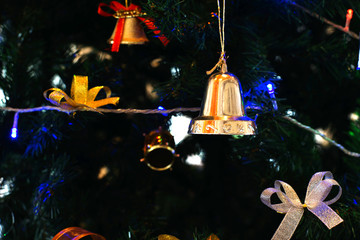 various christmas ornaments decorated on christmas tree