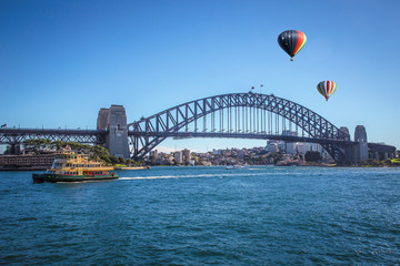 Hot air balloon over Sydney bay in evening, Sydney, Australia
