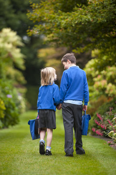 two children in school uniform