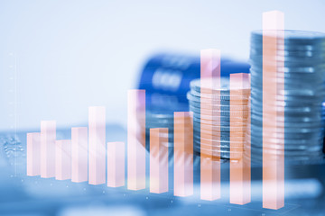 Stacks of coins and account book or credit card on working table, finance, business finance...
