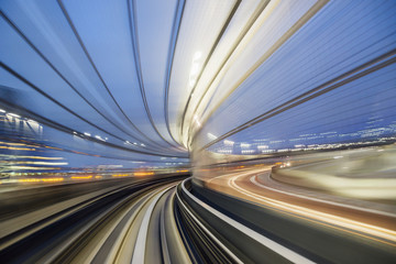 Long exposure of train moving in tunnel