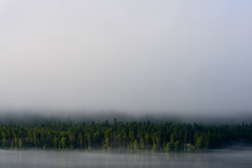 Fog on Lake Teletskoye Lake Teletskoye is the largest lake in the Altai Mountains and the Altai Republic, Russia, and has depth up to 325 meters.