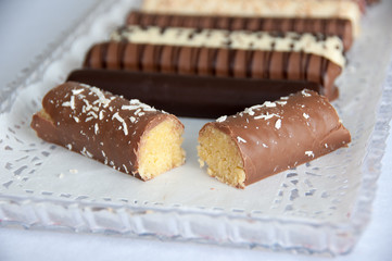 chocolate bar with icing and coconut