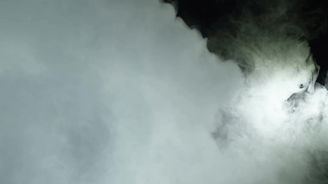Realistic footage of stage light flashing rays spotlights through smoke. Great as a natural stage background for different projects!!!