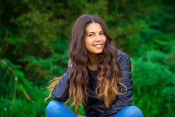 Naklejka premium Portrait of a girl in a black jacket