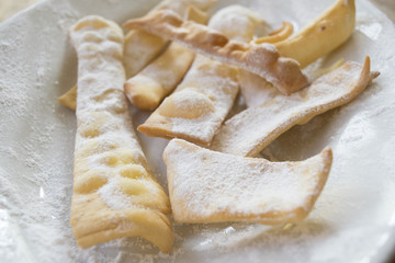 Italian carnival sweet fritters called crostoli or frappe
