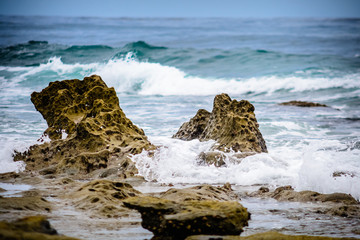 Fototapeta na wymiar Waves hit San Diego coastline