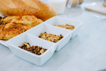 Whole grains for a bakery, put in a Cup, a box and placed on a table in the kitchen, in a  beautiful house.