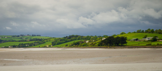 Irish coastline with green hills