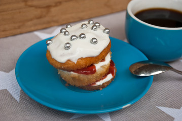 Festive breackfast with iced muffin. Food background.