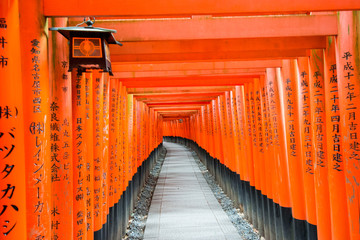 Red Gates of Senbo Torii in Fushimi Inari Taisha in Kyoto City, Japan. June 2017.