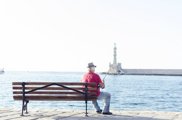 Fisherman on the beach fishing