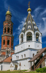 Bell tower of St. John the Theologian monastery in the background of clear sky