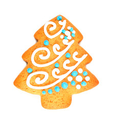 Ginger delicious gingerbread in the form of snowflakes and fir trees, isolated on white background. Holiday gift