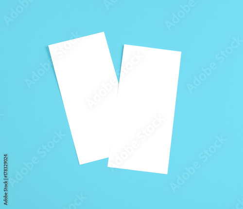 "Blank flyer over blue background to replace your design." Stock photo and royalty-free images