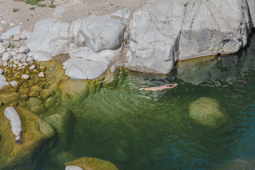 Fototapeta premium Ardeche, gorges, beautiful touristic landscape with people swimming 