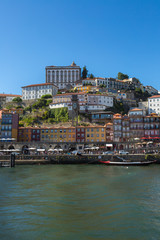 Colorful Facades of Typical Houses on the Bank of the River Dour