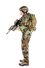 Portrait soldier or private military contractor holding sniper rifle.