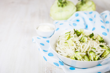 Salad with kohlrabi, cucumber and dill.