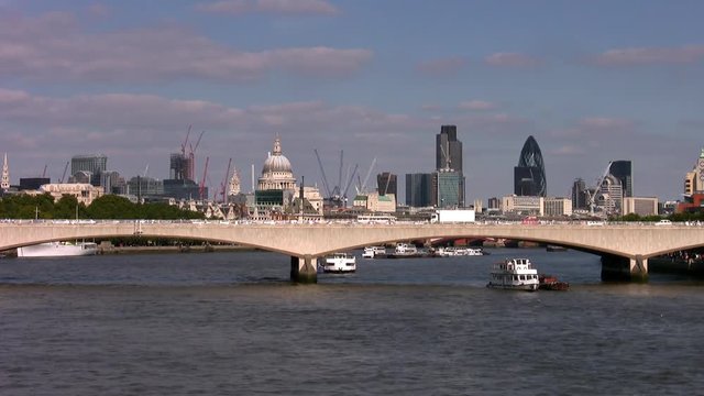 Waterloo Bridge and the dome of St Pauls cathedral with the tower blocks of the city of London in 2008.
