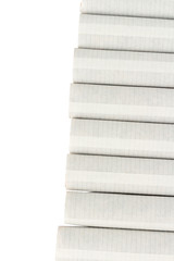 Closeup of a pile of cigarettes on white background