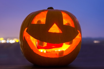 Halloween pumpkin glowing in the dark