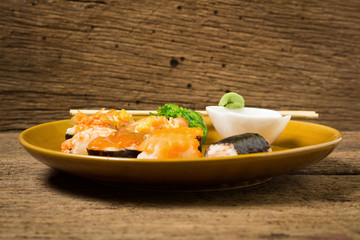 Japanese Cuisine Sushi on old wood