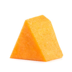 one cut triangular piece of ripe pumpkin