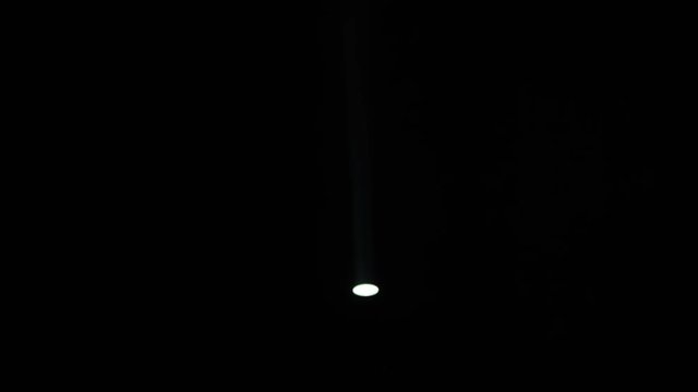 Realistic footage of stage light flashing rays spotlights through smoke. Great as a natural stage background for different projects!!!