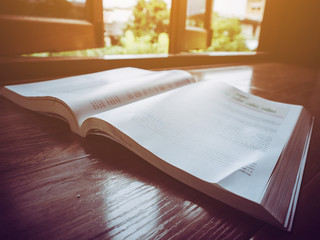 Close up book on the floor at home.
