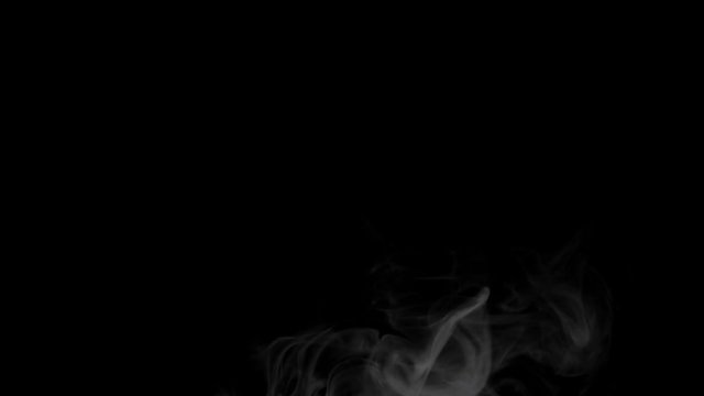 Smoke on black background in slow motion.
