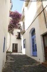 Fototapeta na wymiar White alley in Cadaques, Girona, Spain.
