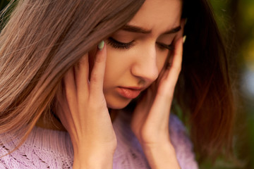 Woman with headache, migraine or stress. Help, troubles in communication, overworking concept