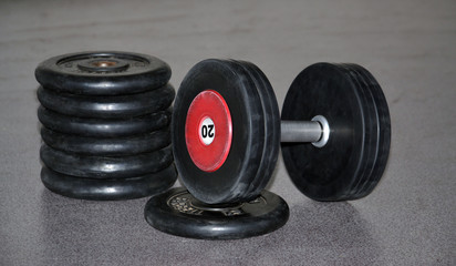 Obraz na płótnie Canvas Sports dumbbell with the weights.
