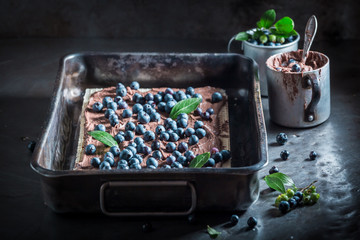 Tasty wafers with fresh blueberries and chocolate