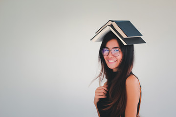 Young asian Student woman holding book with copy space