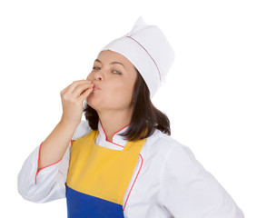 Tasty Food Concept. Beautiful Young Woman Chef Giving a Perfect Gesture with Hand by Kissing Her Fingers