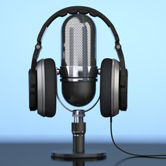 Black Headphones over Microphone. 3d Rendering