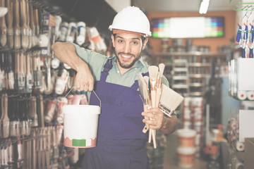 Master buying paint and tools