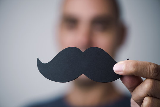 Young Man With A Fake Moustache