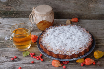 Pear cake, tea and Bank of pear jam
