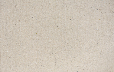 Smooth surface of brown carton or cardboard, background or texture of paper cardboard