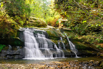 Waterfall Ternoshorsky Huk in Snidavka. Carpathian Mountains, Ivano-Frankivska oblast, Ukraine.