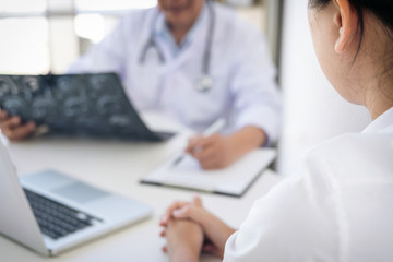 Professor Doctor report and recommend a method with patient treatment, results on brain x-ray film...