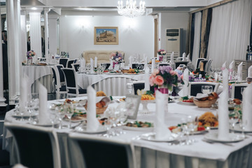 Obraz na płótnie Canvas the restaurant, set tables with white table cloths