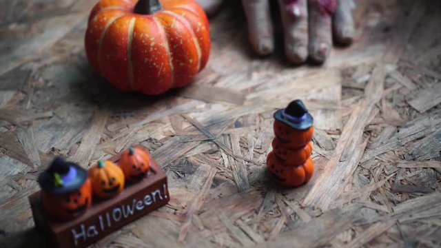 Halloween day footage with skull, pumpkin, candle light, and movement