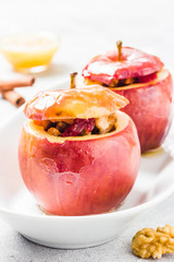 Caramel oatmeal stuffed apples. Selective focus, copy space, close up.